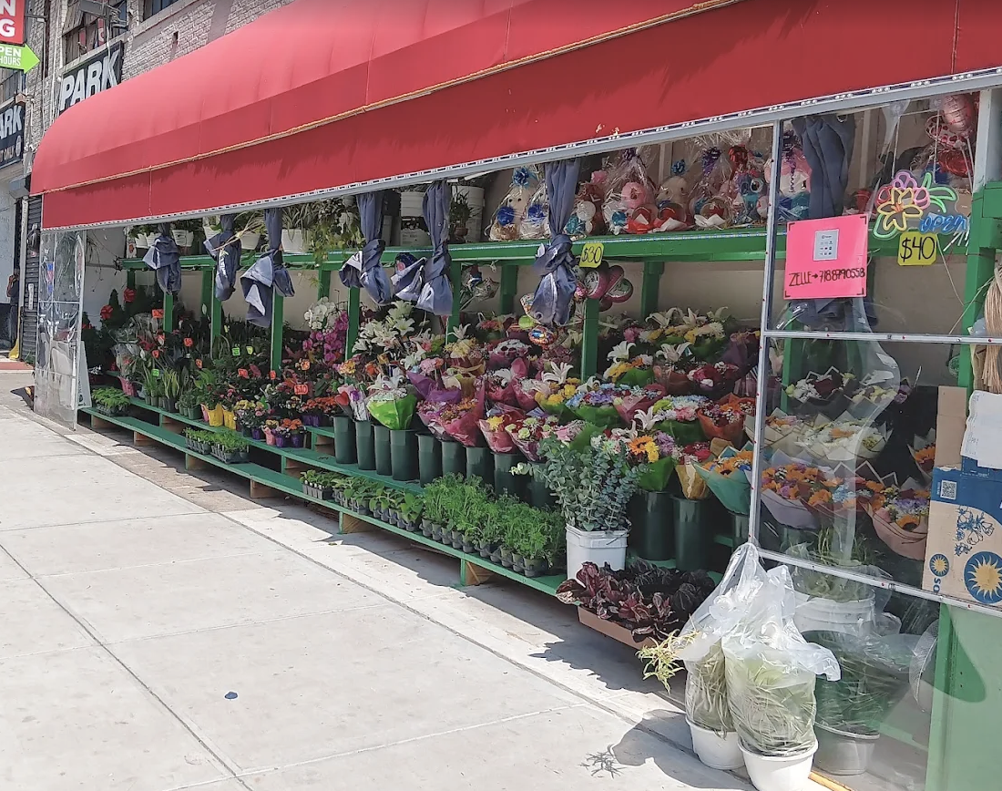 Sidewalk display of fresh bouquets, plants and gifts at Irvald's Flowers Corp in the Bronx